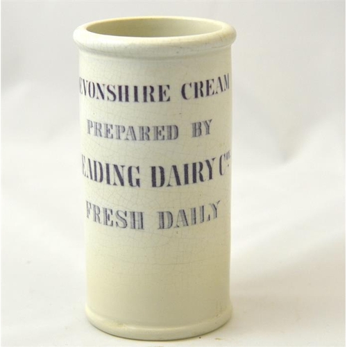 519 - A mauve print cylinder cream pot from the Reading Dairy Co 13cm high.