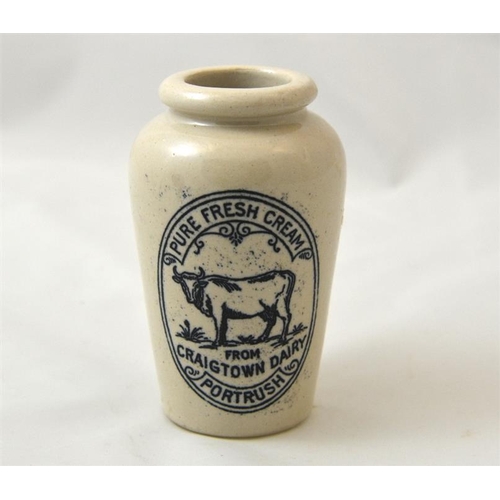 520 - A cream pot with cow transfer from the Craigtown Dairy Portrush 12cm high.