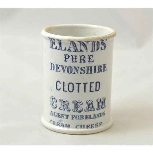 522 - A cylinder cream pot for Eland's Clotted Cream in mauve print 8.5cm high.