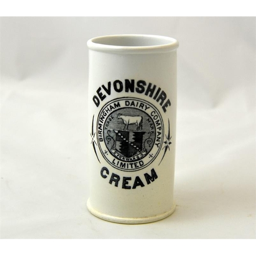 526 - A cylinder cream pot from the Birmingham Dairy Co 12.5cm high.