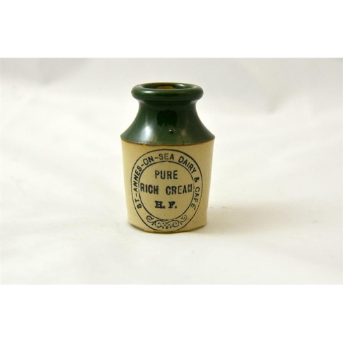 527 - A green top cream pot from the St Annes-on-sea Dairy & Café 8cn high.