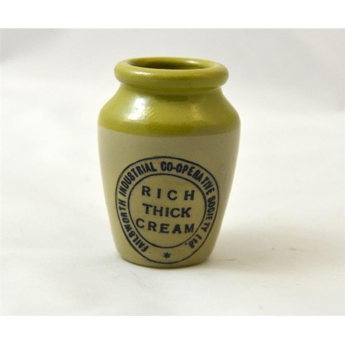 528 - A green top cream pot from Failsworth Industrial Co-operative Society 7.5cm high.