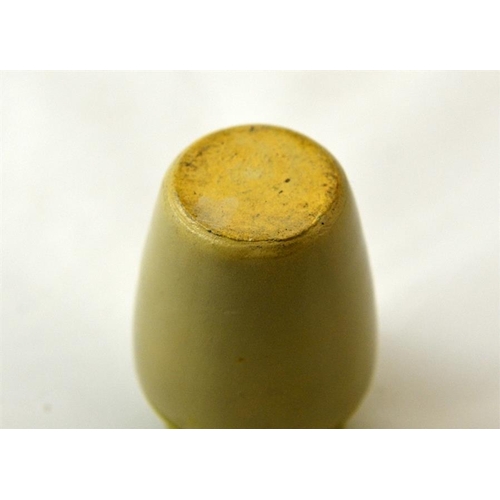 528 - A green top cream pot from Failsworth Industrial Co-operative Society 7.5cm high.