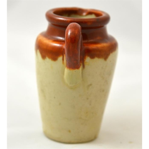 538 - A brown top cream jug from White Heather Dairy Grayshott 10cm high.