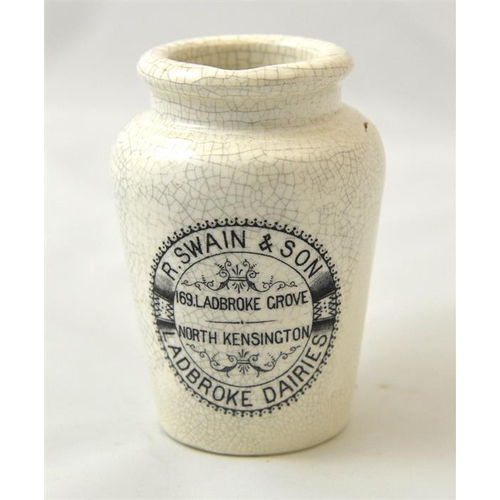 547 - A cream jug from R Swain & Sons Ladbroke Dairies North Kensington. Dairy Outfit Co base mark 10cm hi... 