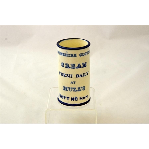 554 - A cylinder cream pot from Hull's of Nottingham with blue transfer 12cm high.