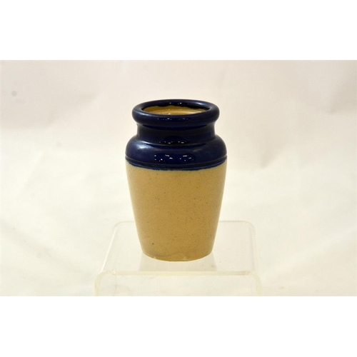 557 - A blue top cream pot from Abbott Bros, Leytonstone, Woodford, Forest Gate, East Ham 9.5cm high.