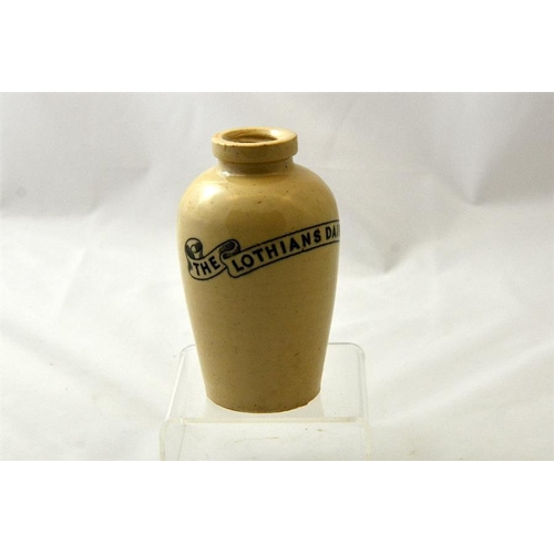 571 - A Lothians Dairy Co milk jar with internal screw thread 13.5cm high.