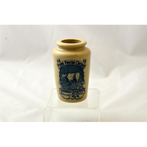 572 - A blue transfer cream pot from Andrew Cameron, Provision Merchant, Ayr 11cm high.