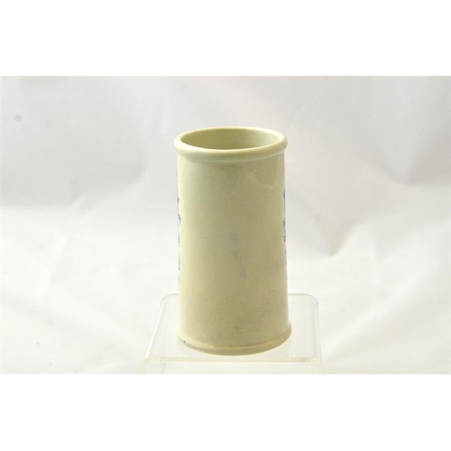 576 - A blue print cylinder cream pot from Pettey's Dairy, Bournemouth with floral border 12cm high.