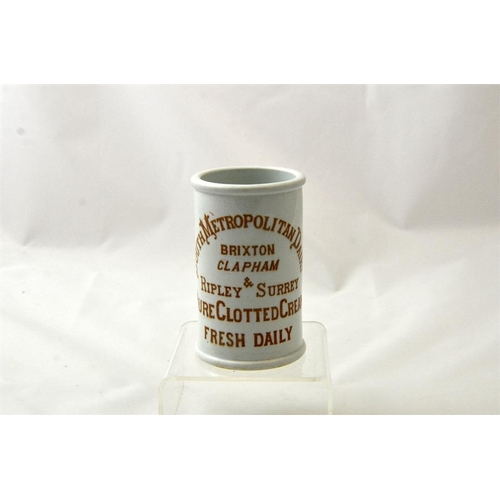 579 - A sepia print cylinder cream pot from the South Metropolitan Dairy, Brixton, Clapham and Ripley, Sur... 