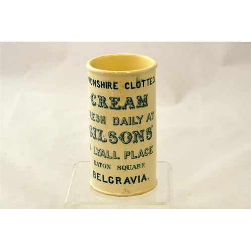 596 - A cylinder cream pot in green print from Gilson's of Belgravia 12cn high.