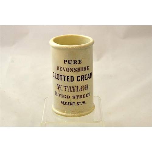 597 - A cylinder cream pot from W Taylor, Vigo Street, London 12cm high.