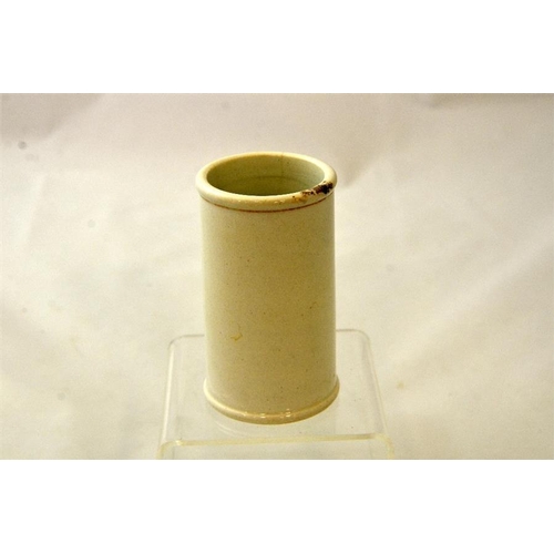 598 - A black print cylinder cream pot from Matthew & Sons Cambridge 10.5cm high.