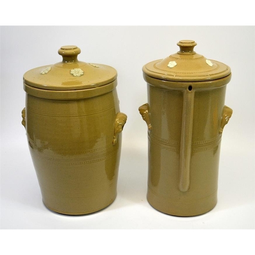 626 - Two stoneware advertising water filters, including the Atkins Filter Engineering & Water Softening C... 