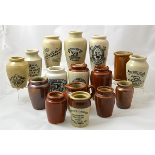 633 - A group of named stoneware cream pots and jars, including Stewarty Creamery, John Melrose, St Annes-... 