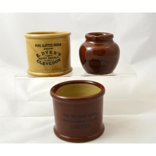 649 - Two honey and brown glaze cylinder cream pots from E. Dyer's Dairy Supply Clevedon and The Polsloe D... 