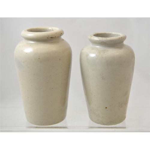 650 - Two cream pots from the Killeshandra and Newmarket Dairy Co (2) 12cm high..