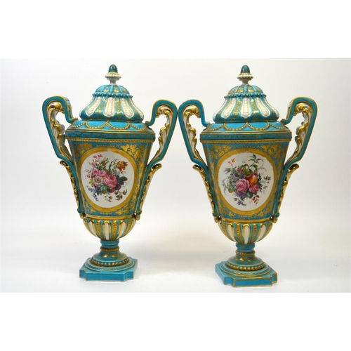 1593 - A pair of 19th century Sevres style vase and covers, decorated with panels after Watteau, and floral... 