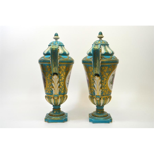 1593 - A pair of 19th century Sevres style vase and covers, decorated with panels after Watteau, and floral... 