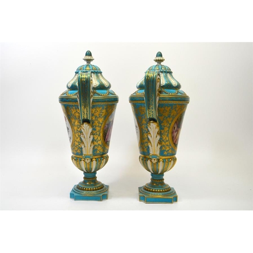 1593 - A pair of 19th century Sevres style vase and covers, decorated with panels after Watteau, and floral... 