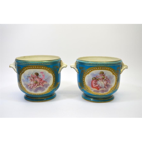 1594 - A pair of 19th century Sevres style cashepots, decorated with panels of heavenly cherubs on a  Bleu ... 