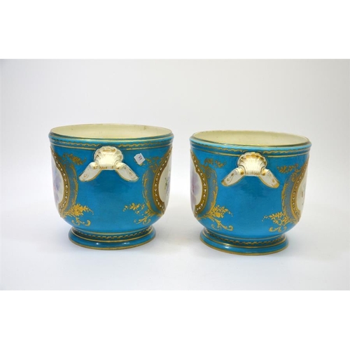 1594 - A pair of 19th century Sevres style cashepots, decorated with panels of heavenly cherubs on a  Bleu ... 