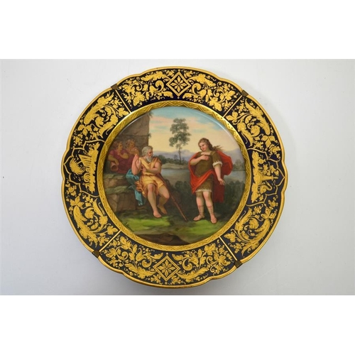 1595 - A Vienna syle plate, painted with an allegorical scene, cobalt border with raised paste gilding, sig... 