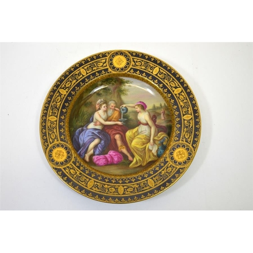 1596 - A Vienna syle plate, painted with an allegorical scene, cobalt border with raised paste gilding, blu... 