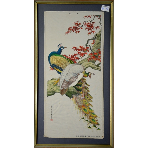 49 - A pair of Oriental prints on fabric, depicting peacocks and cranes, 59cm x 28cm (2)