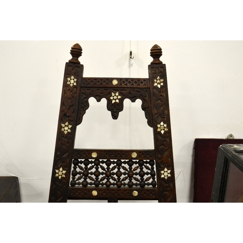 185 - An Anglo Indian carved rosewood and inlay easel, carved foliate decoration, with adjustable pegs, 13... 