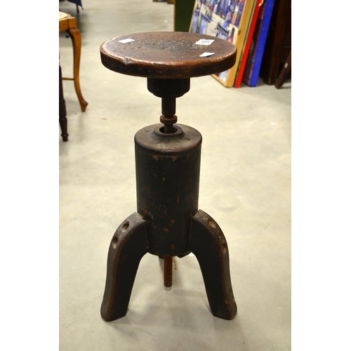 189 - A 19th century piano stool, revolving adjustable seat, on tripod base