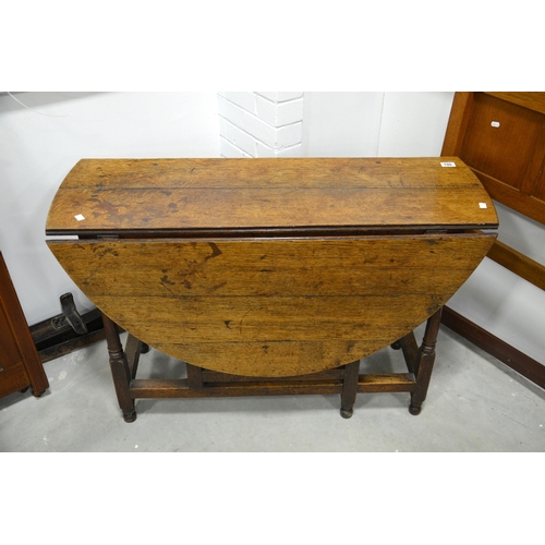 190 - An 18th century oak gateleg table, circa 1720, the single drawer with drop handle, turned column leg... 