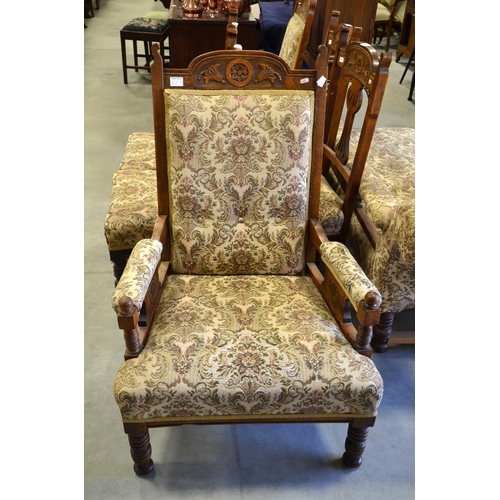 213 - A Victorian Aesthetic Movement salon suite, Arts and Crafts style fretted splats, on turned legs, in... 