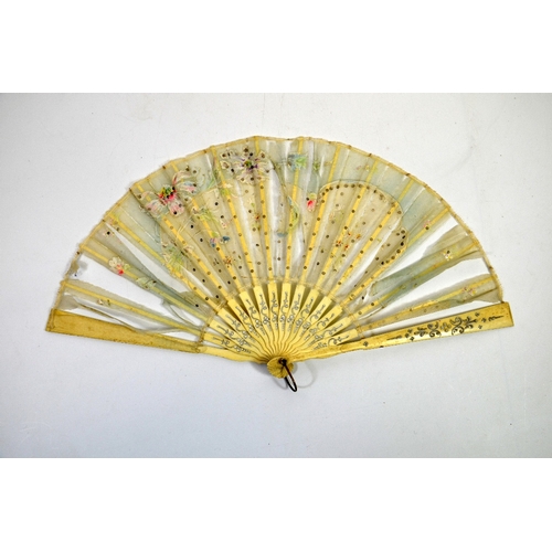 81 - Japanese clothing including three early 20th century silk komonos, two fans, sandals and other shoes... 