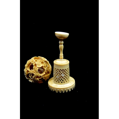 96 - λ A Chinese carved ivory puzzle ball on stand, 19th century, the six sphere ball, carved with dragon... 