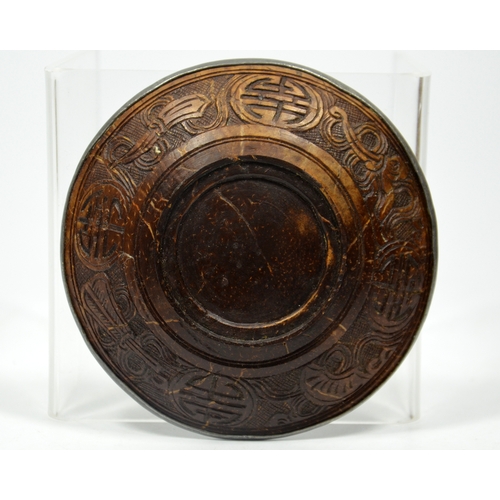 39 - A Chinese bamboo brush pot, cylindrically formed and carved with figures in a wooded landscape, and ... 