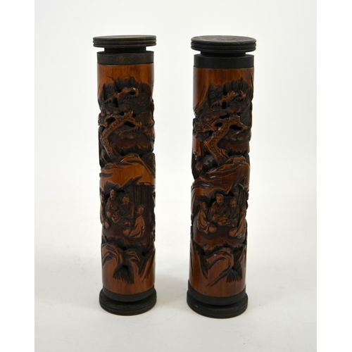 18 - A pair of Chinese carved bamboo and reticulated joss stick holders, relief carved in the round with ... 