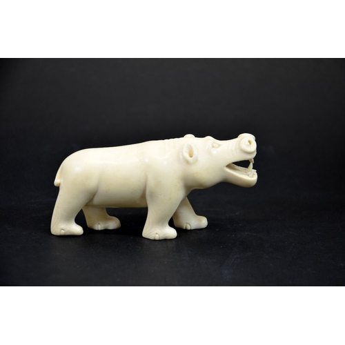 23 - λ A 19th century African carved ivory figure of a hippo, modelled with mouth open, 11.5cm long