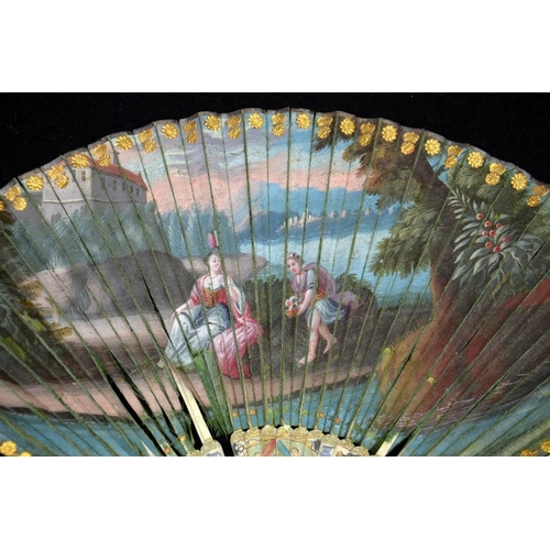 38 - λ A rare late 17th - early 18th century silk fan. The double silk leaf hand painted with an elegant ... 