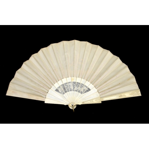 40 - λ A 19th century hand painted and signed silk and ivory fan, the guards carved with a simple foliate... 