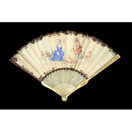 42 - λ An early 18th century ivory fan, with carved ivory sticks and guards, the guards carved with figur... 