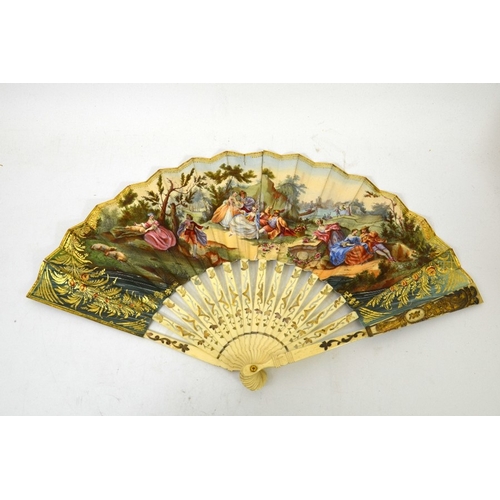 49 - A 19th century bone  and printed fan, reticulated sticks with silver and gilt overlay, a coloured pa... 