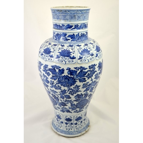 5 - A large Chinese Kangxi blue and white vase, inverse baluster form, decorated with lotus scrolls in t... 