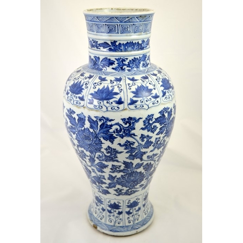 5 - A large Chinese Kangxi blue and white vase, inverse baluster form, decorated with lotus scrolls in t... 