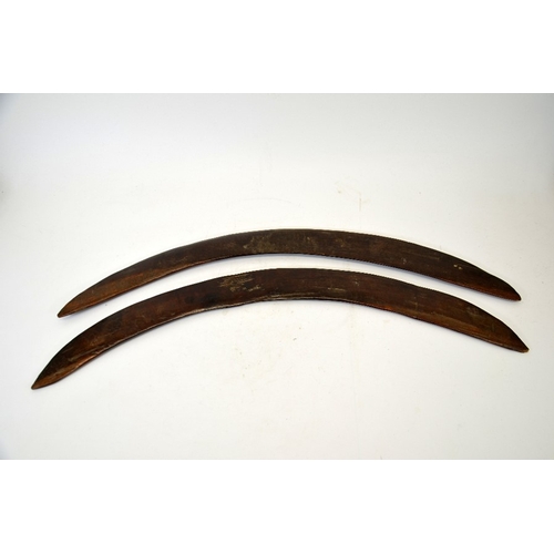 53 - Two 19th century Australian Aboriginal boomerangs, carved wood, each with three lines engraved to on... 