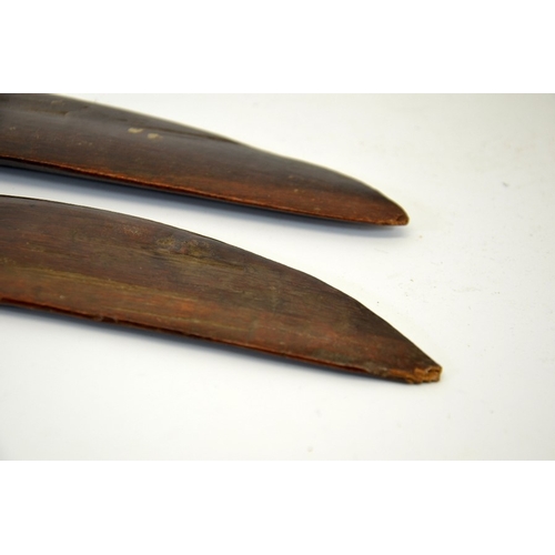 53 - Two 19th century Australian Aboriginal boomerangs, carved wood, each with three lines engraved to on... 