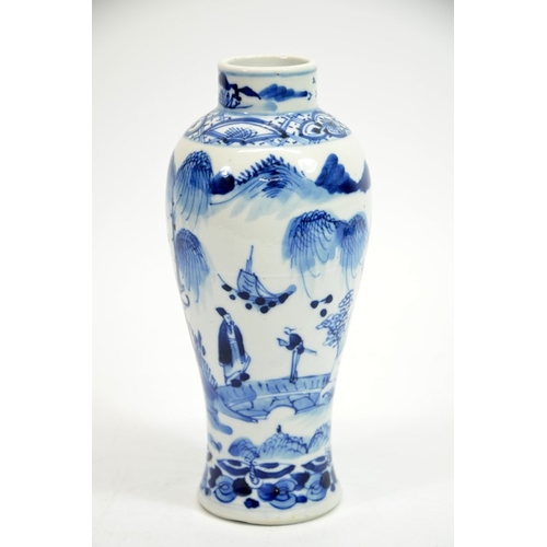 6 - A Chinese blue and white vase, Kangxi mark and probably of the period, painted in the round with tem... 