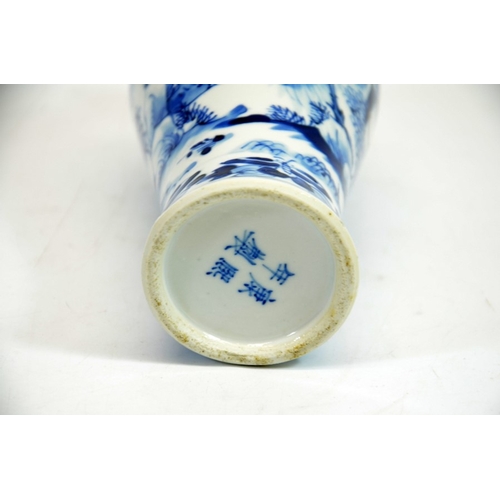 6 - A Chinese blue and white vase, Kangxi mark and probably of the period, painted in the round with tem... 