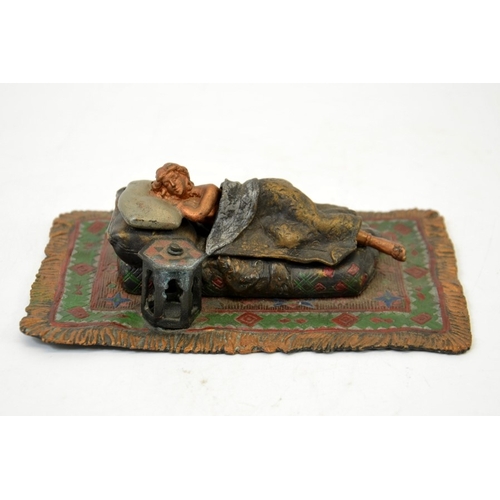 61 - After Franz Bergmann, an Austrian cold painted bronze, modelled as a sleeping nude woman, with remov... 